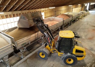 front loader loading autobatch fertilizer blender hoppers