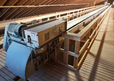 Tail-end of the Tri-Slide overhead dry fertilizer conveyor with Three-Way Tripper