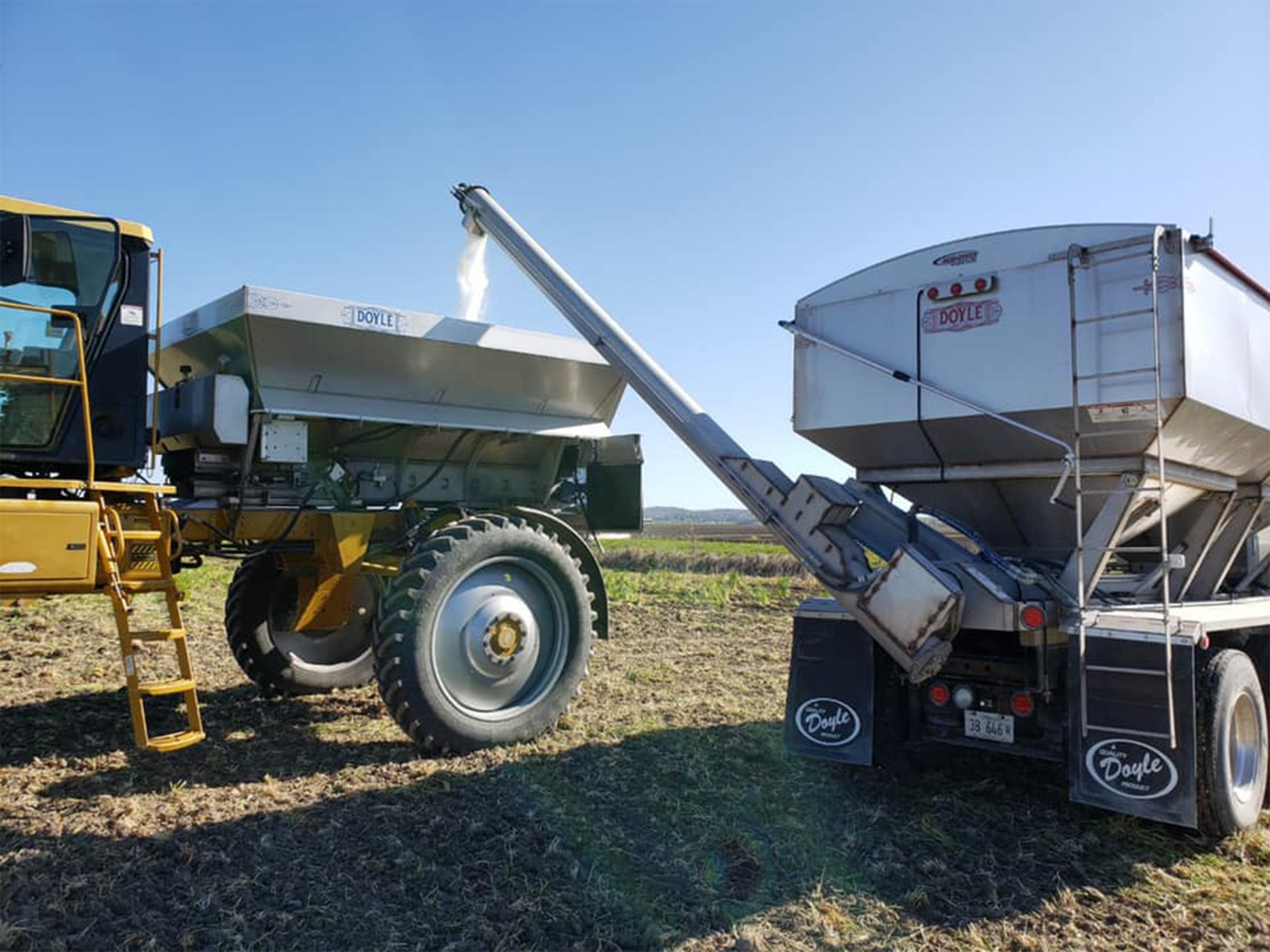 tending-loading-into-bigshot-spreader-applicator